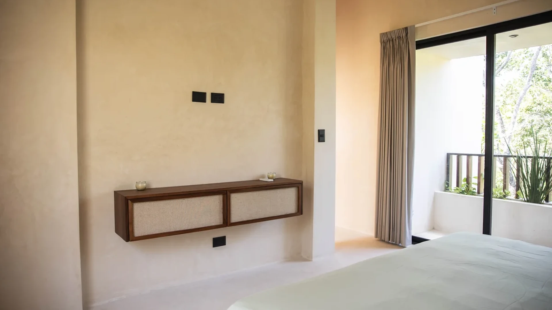 View of Modern Bedroom at Afra Jungle, showcasing Minimalist Design, Private Balcony.