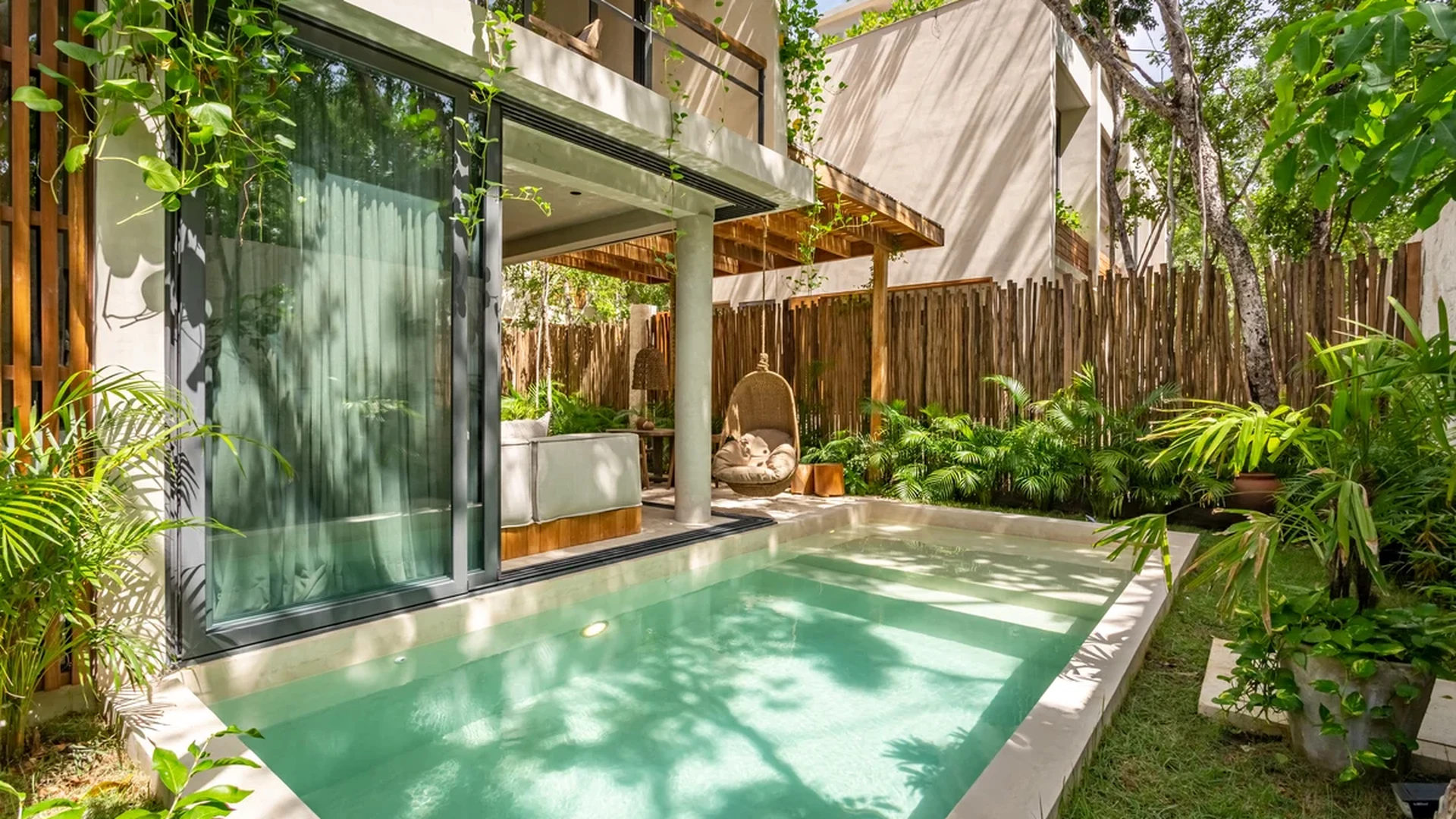 Image of a Private Plunge Pool, featuring Indoor-Outdoor Living and Lush Garden.