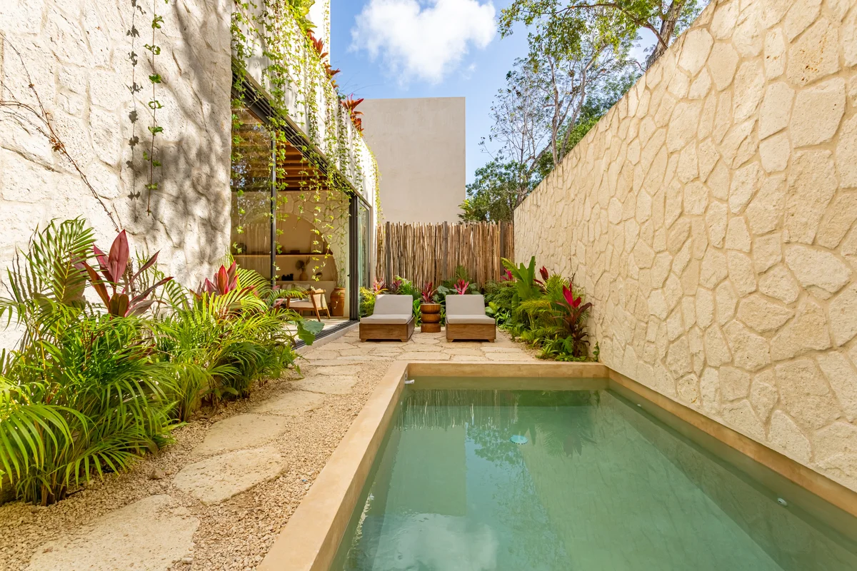 Image of a Private Plunge Pool, featuring Stone Courtyard and Indoor-Outdoor Living.