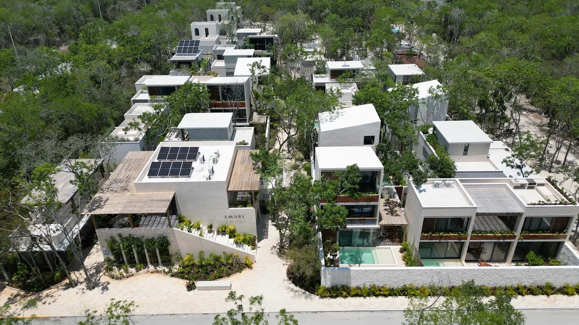 Image of a Modern Villa Complex, featuring Jungle Retreat and Aerial View.