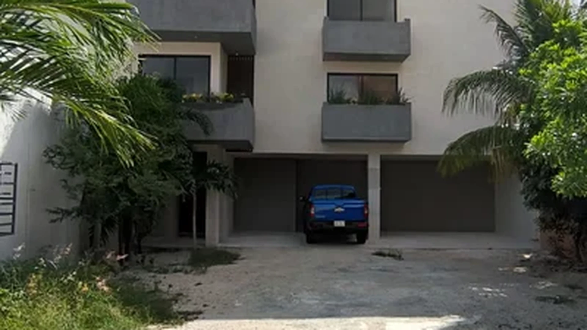 Image of Parking at Amanecer, featuring Modern Residential Building, Contemporary Facade.
