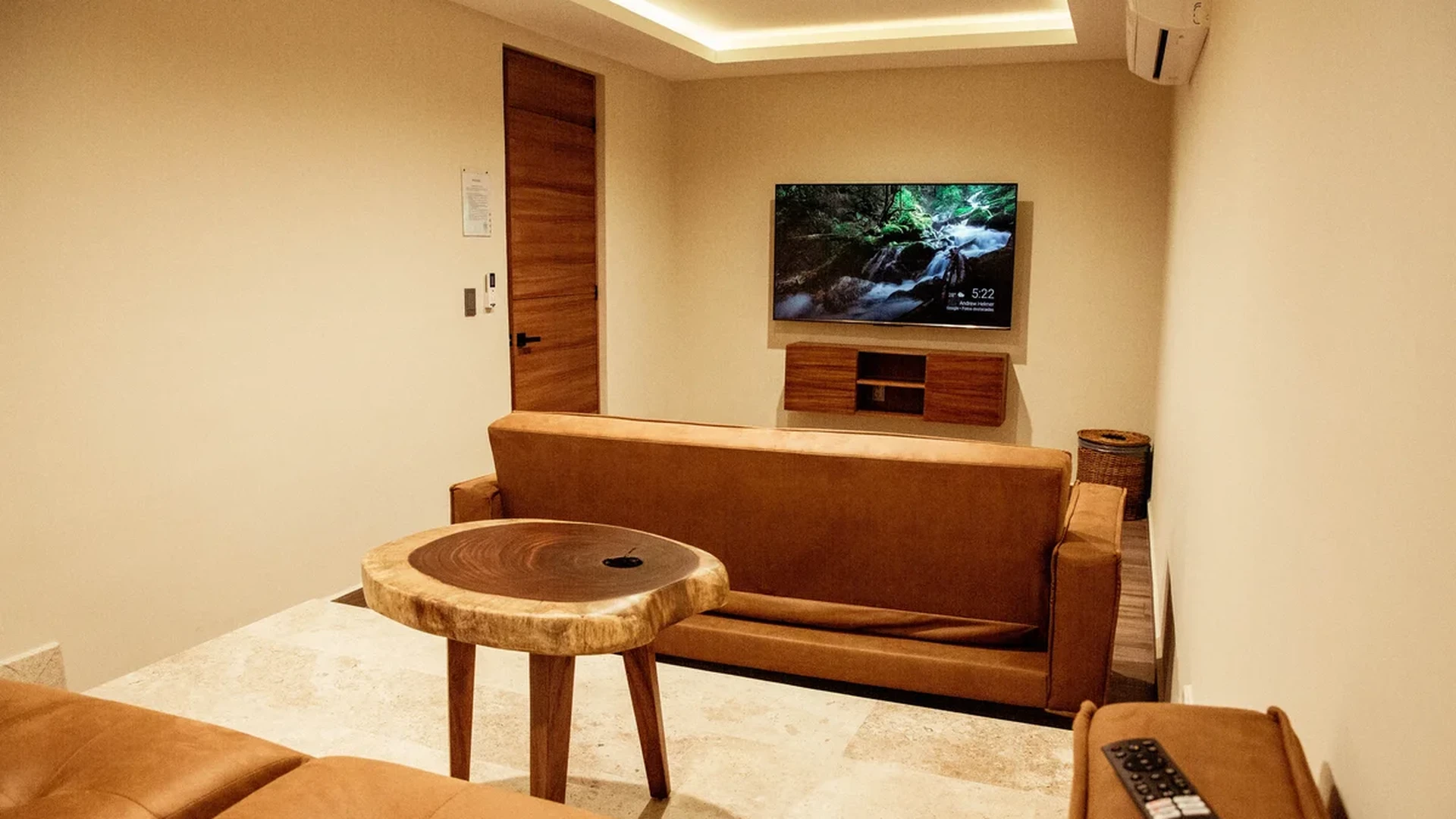 View of Living Room at Amaru, showcasing Modern Interior, Leather Sofa.