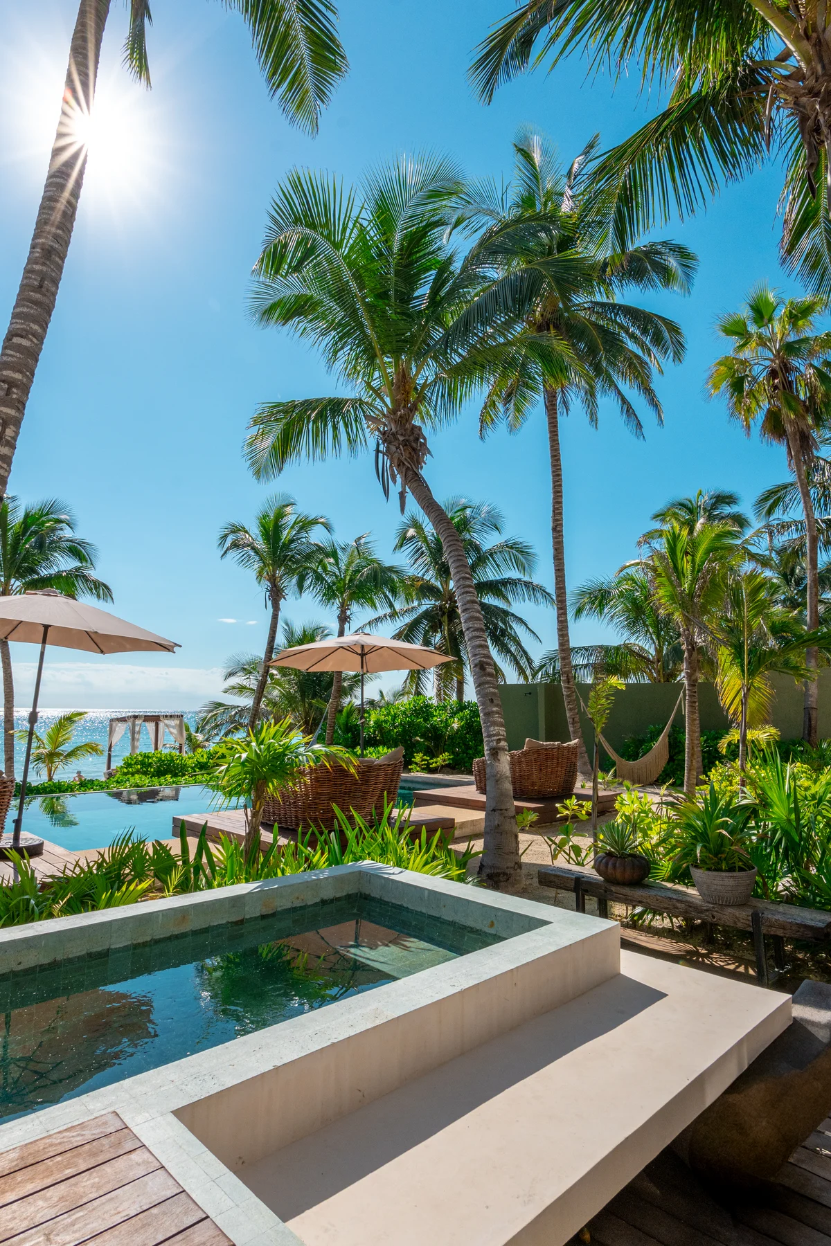 Image of Swimming Pool at Bespoke, featuring Tropical Landscape, Oceanfront Property.