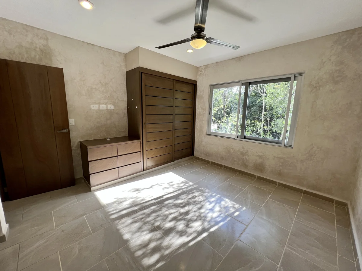 View of Bedroom at Carmela, showcasing Spacious Bedroom, Natural Light.