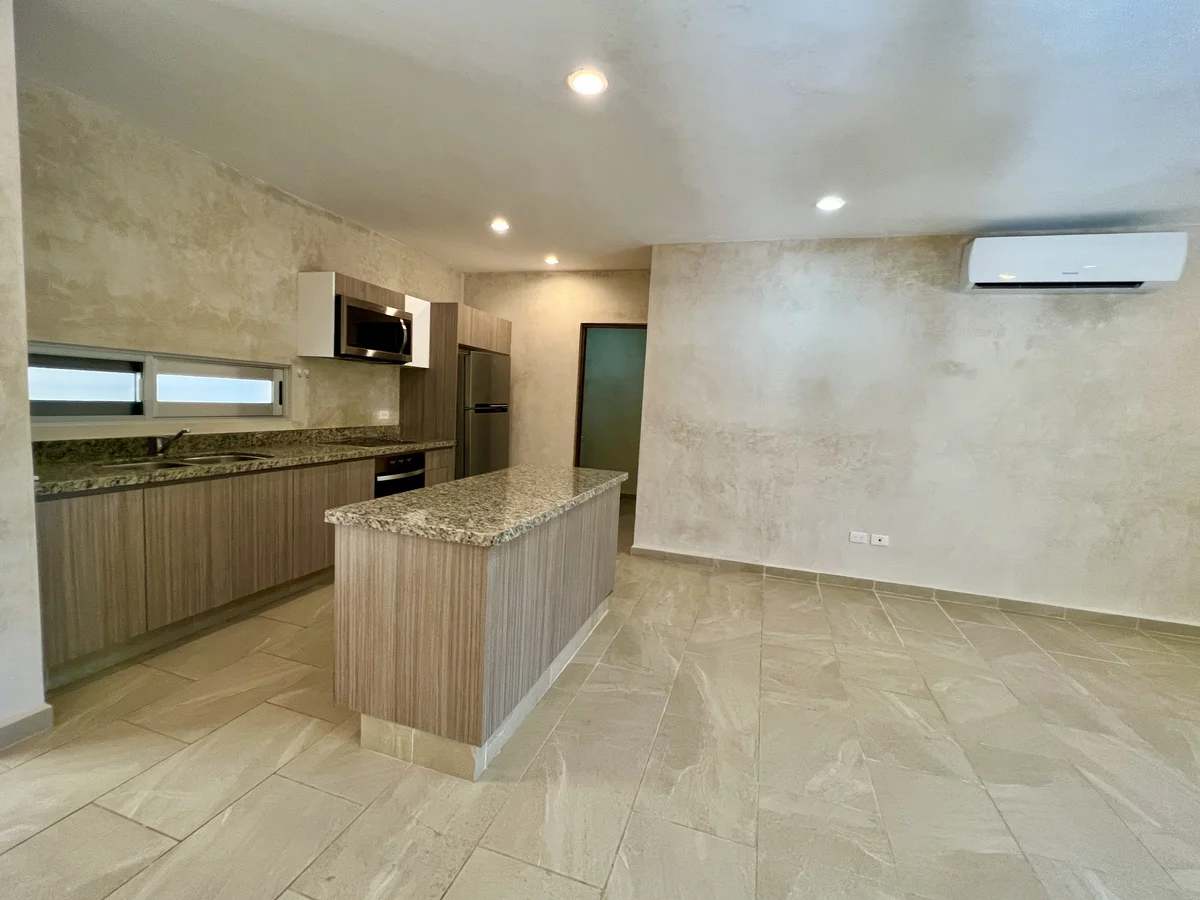 View of Modern Kitchen at Carmela, showcasing Open Concept Living, Granite Countertops.