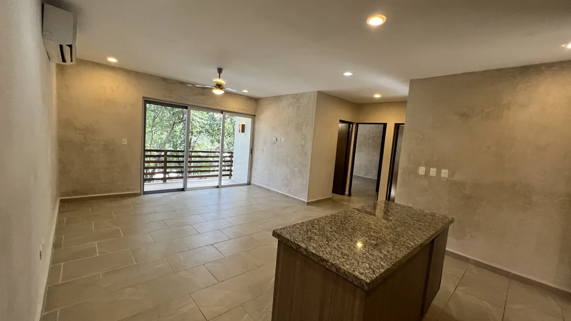 View of Open Concept Living at Carmela, showcasing Residential Interior, Granite Kitchen Island.