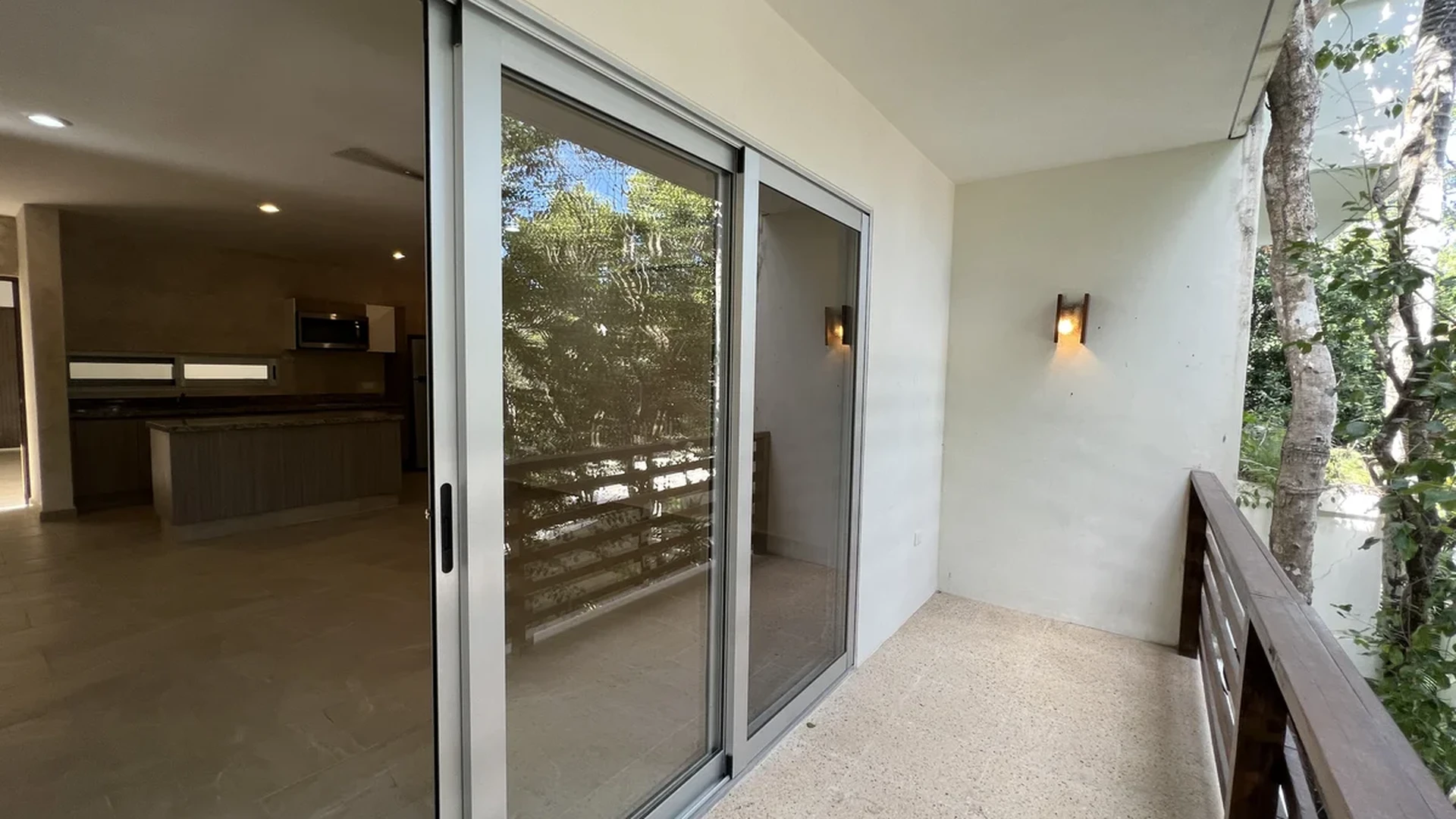 View of Private Balcony at Carmela, showcasing Outdoor Space, Sliding Glass Doors.