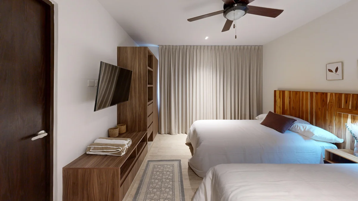 View of Bedroom at Costa Caribe, showcasing Modern Bedroom, Double Beds.