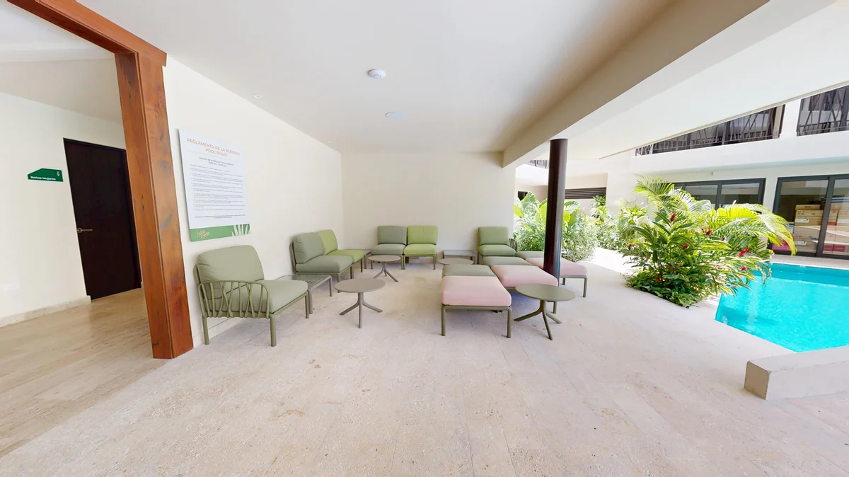 Image of Swimming Pool at Costa Caribe, featuring Outdoor Lounge, Poolside Seating.