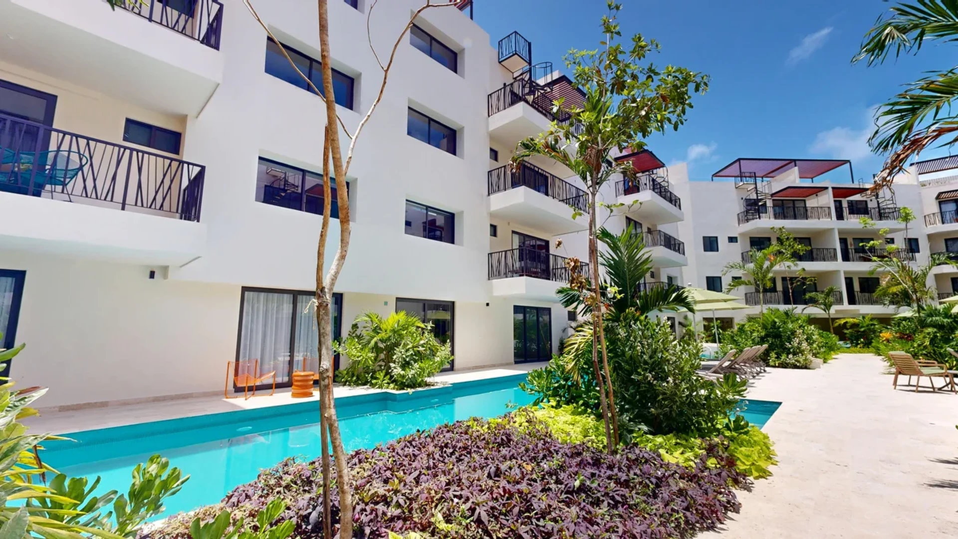 Image of Swimming Pool at Costa Caribe, featuring Modern Architecture, Exterior View.