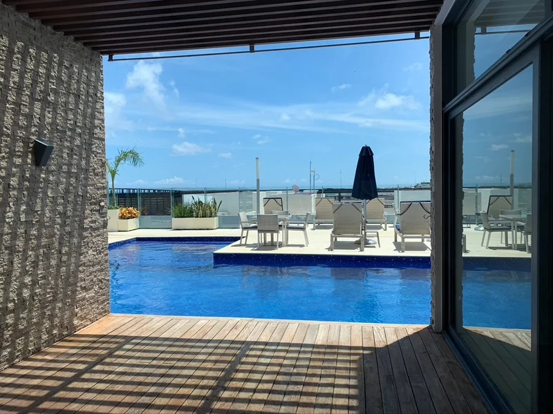 Image of Swimming Pool at Cruz con Mar, featuring Rooftop Pool, Outdoor Living.