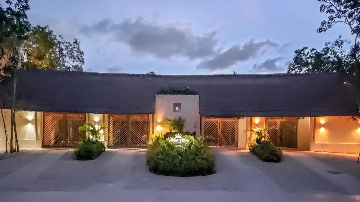 Image of Garden at Fruits Losantos, featuring Building Facade, Thatch Roof.