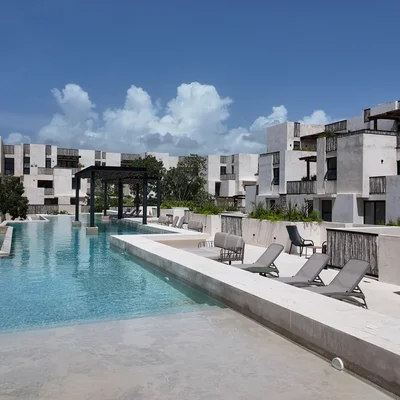 Discover Gran Tulum, a luxury jungle oasis in Tulum with unparalleled living experience and eco-conscious design. Explore the final residences.