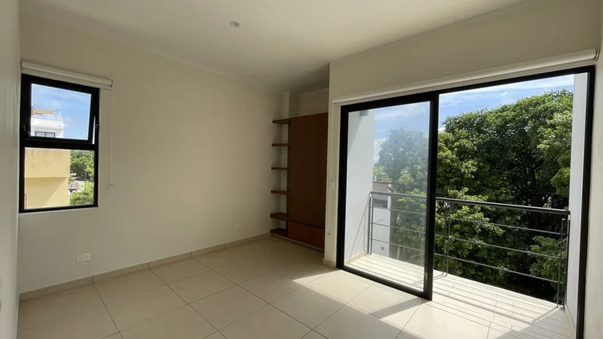 View of Unfurnished Room at Inzignia, showcasing Empty Space, Bright Interior.