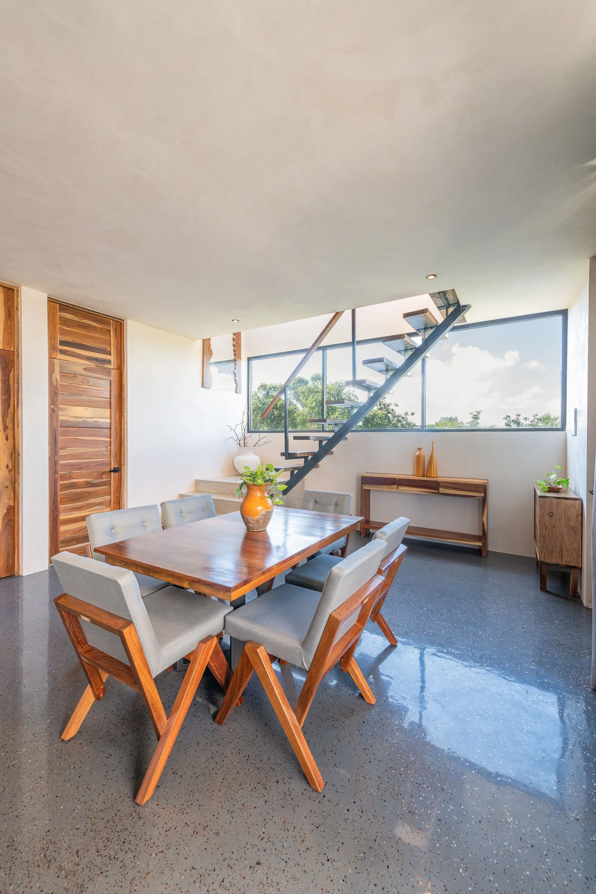 View of Modern Dining Room at Irie, showcasing Open Plan Living, Contemporary Design.