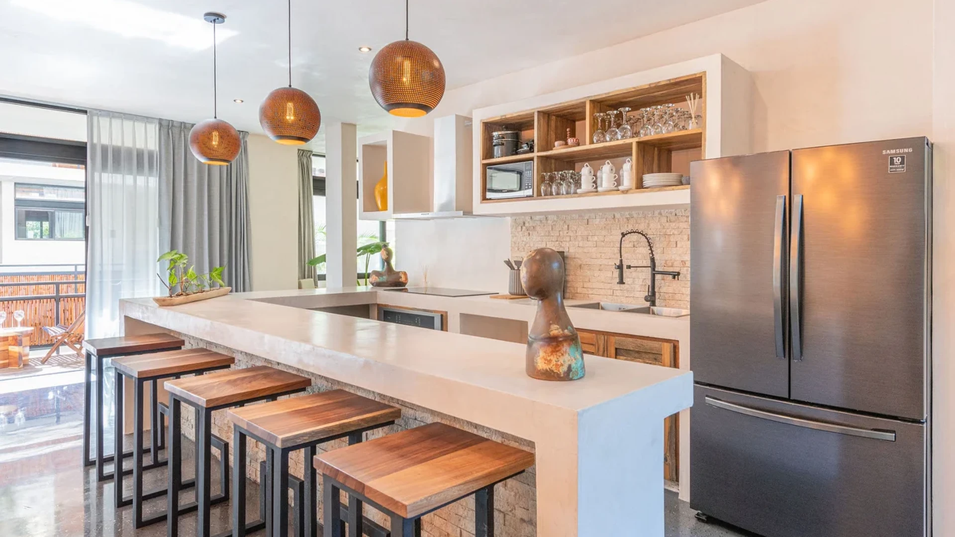 View of Modern Kitchen at Irie, showcasing Kitchen Island, Bar Seating.