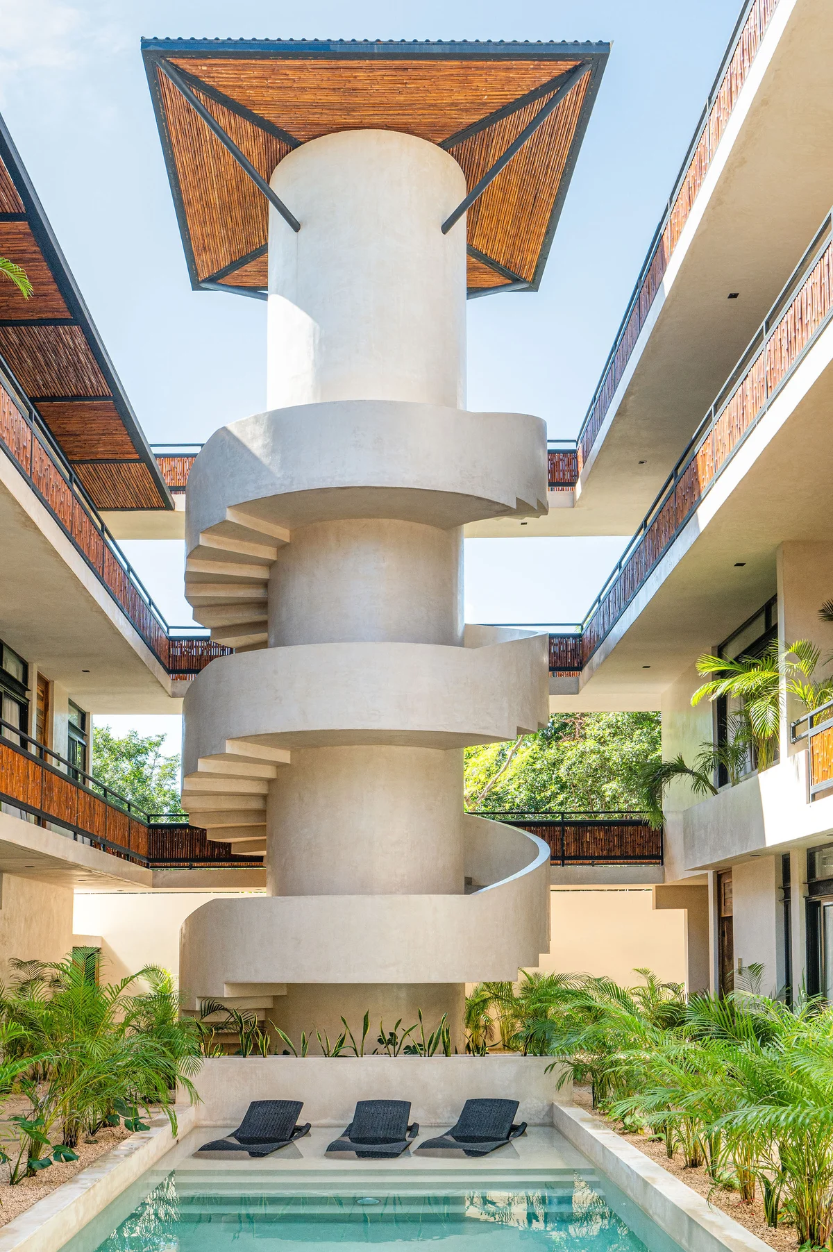 Image of Swimming Pool at Irie, featuring Modern Architecture, Spiral Staircase.