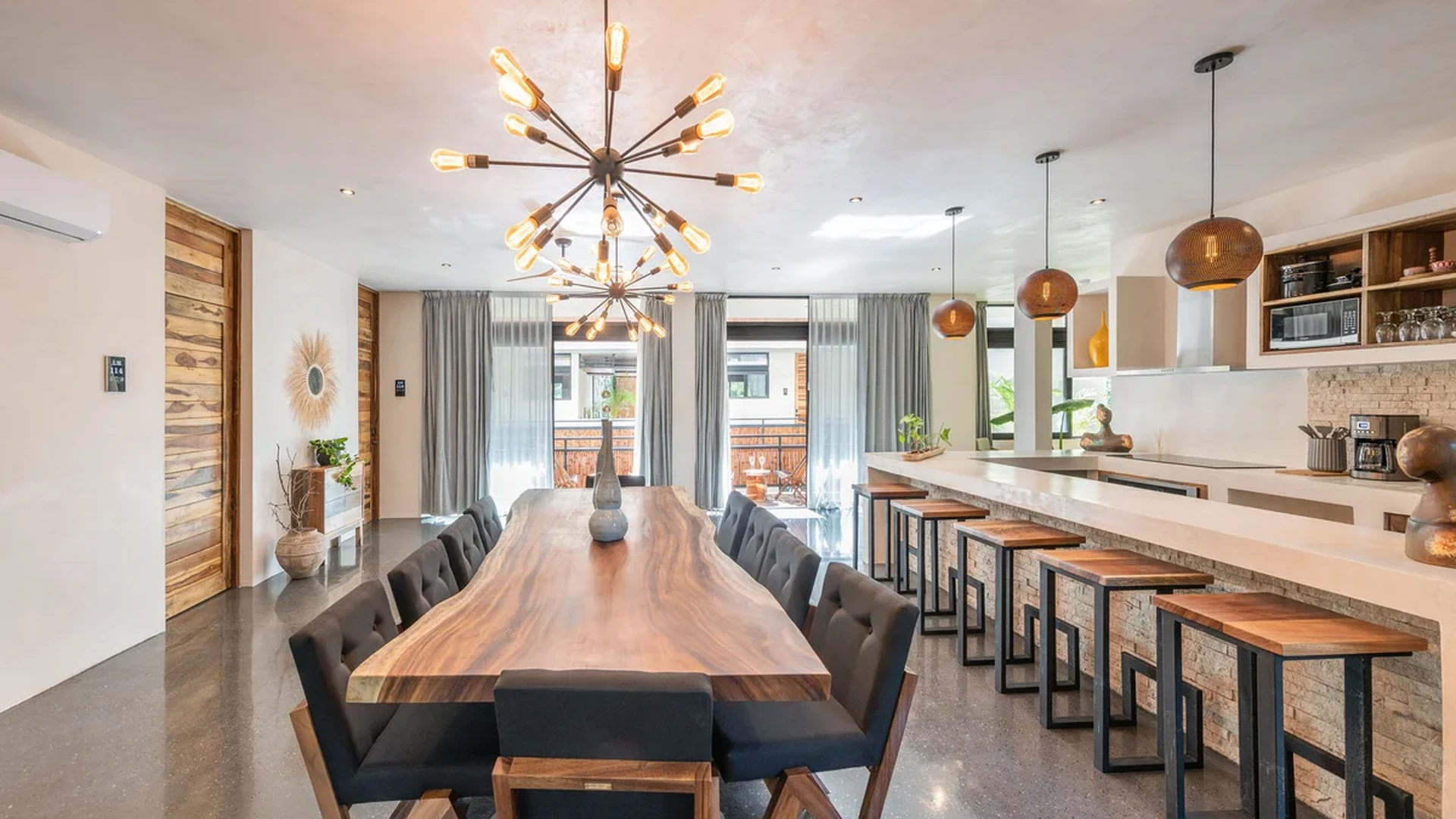 View of Modern Dining Room at Irie, showcasing Gourmet Kitchen, Open Concept Living.