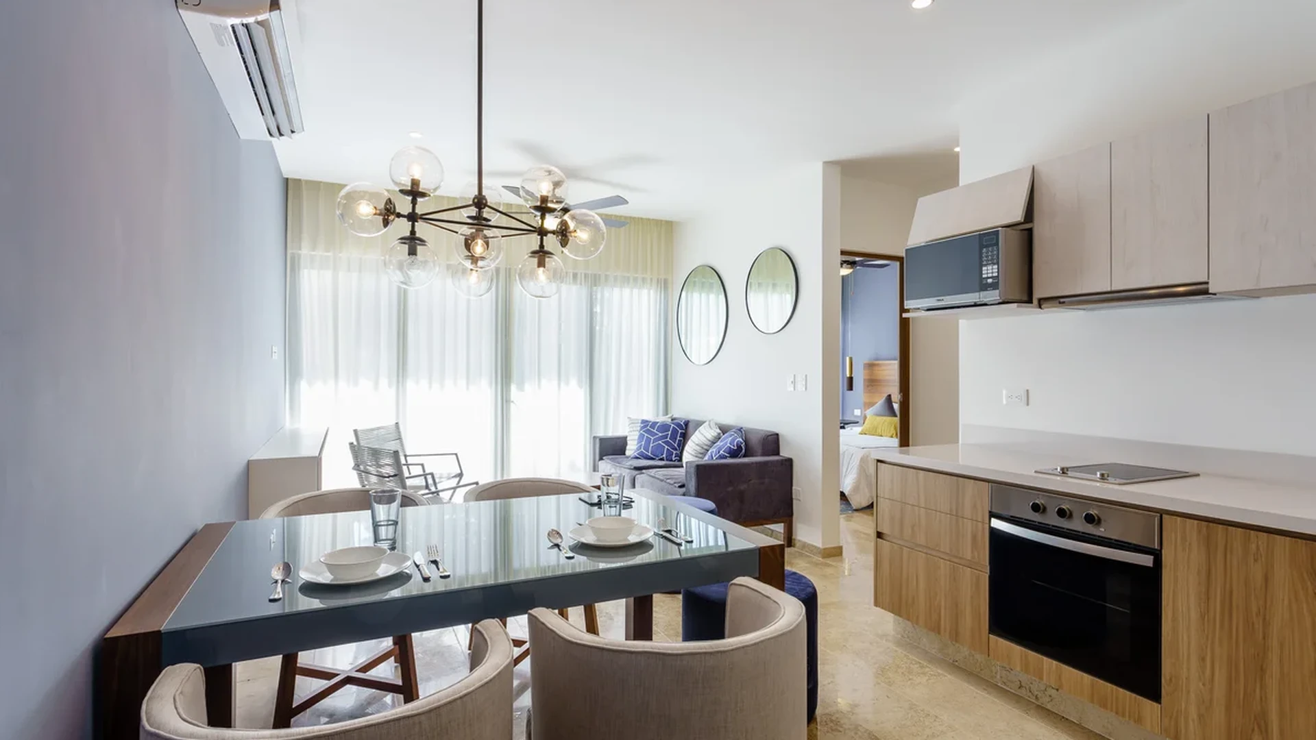 View of Open Concept Living at Ipana, showcasing Modern Kitchen, Dining Area.