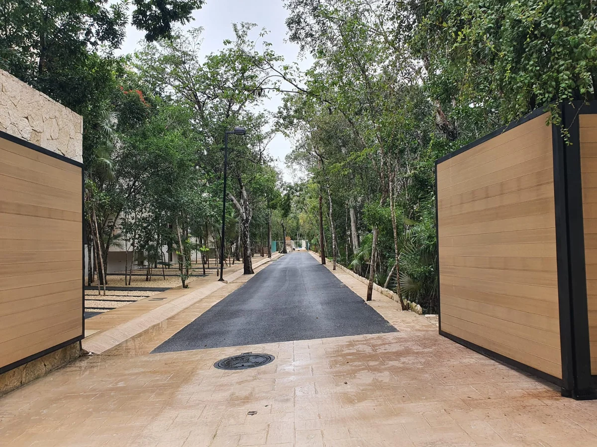 Image of Garden at Jungle Park Residences, featuring Property Entrance, Tree-lined Driveway.