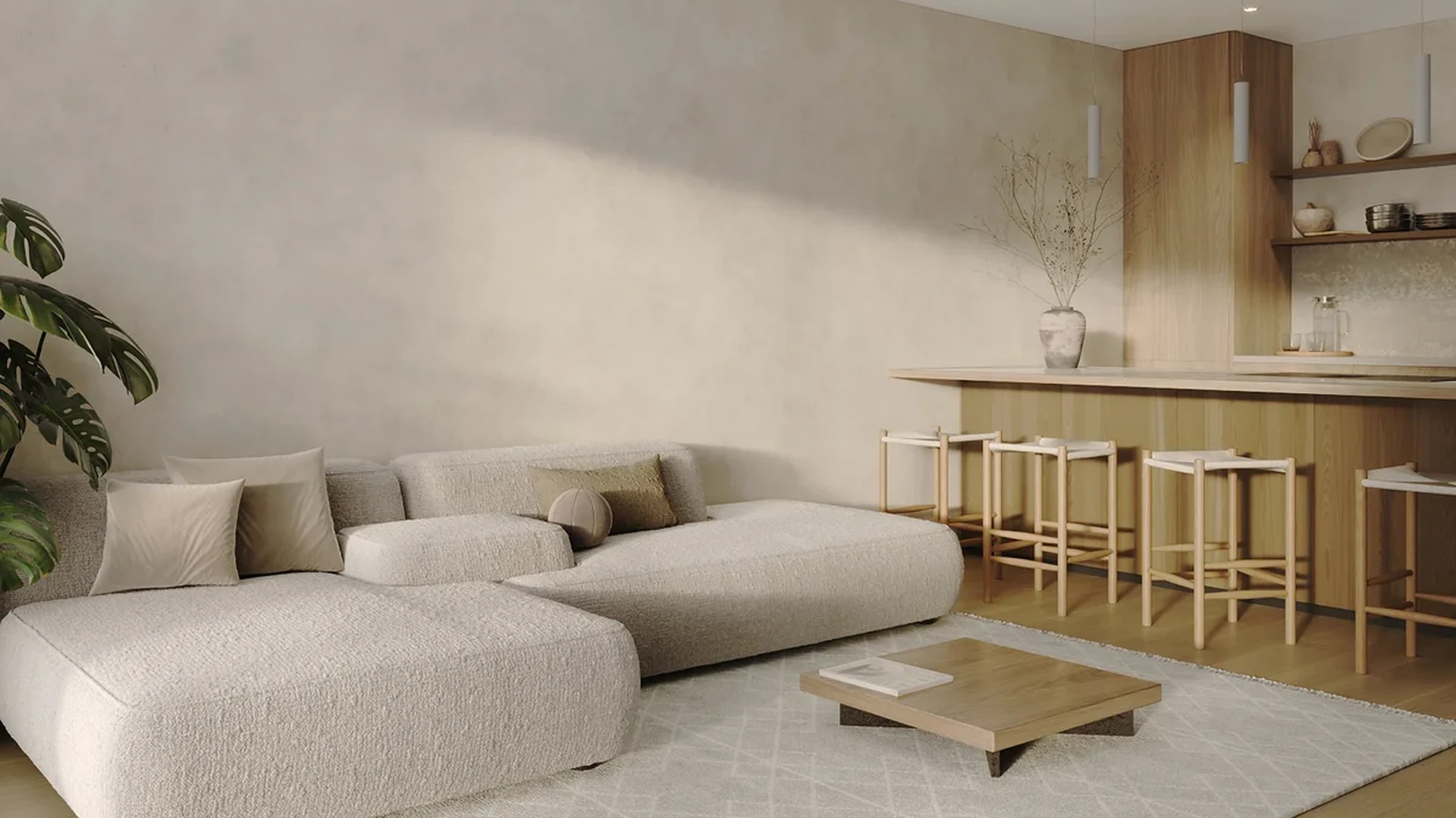 View of Modern Living Room at Ki Residences, showcasing Open Concept Kitchen, Bar Seating.