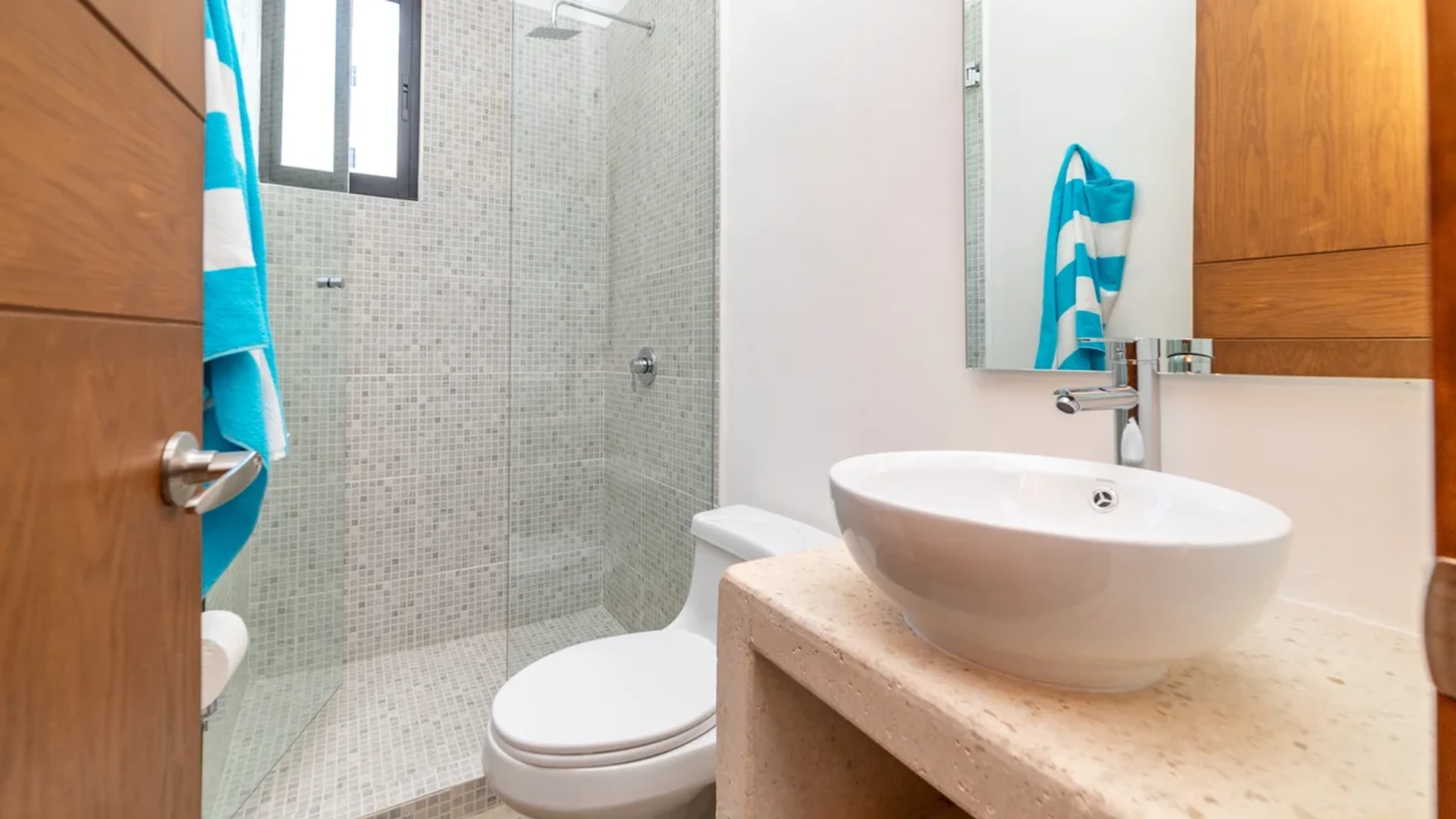 View of Modern Bathroom at Kim-Koba, showcasing Vessel Sink, Rain Shower.