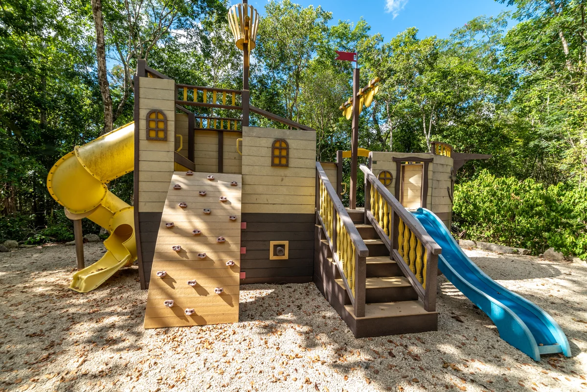 View of Children's Playground at Kim-Koba, showcasing Outdoor Play Area, Family Amenities.