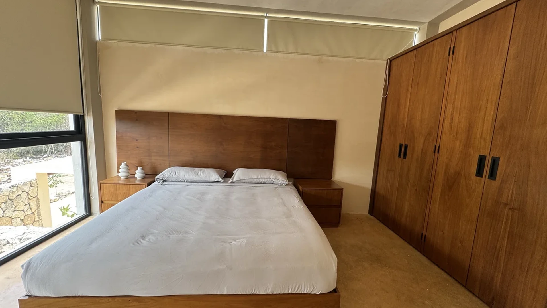 View of Bedroom at Limas Tulum, showcasing Modern Bedroom, Wooden Furniture.