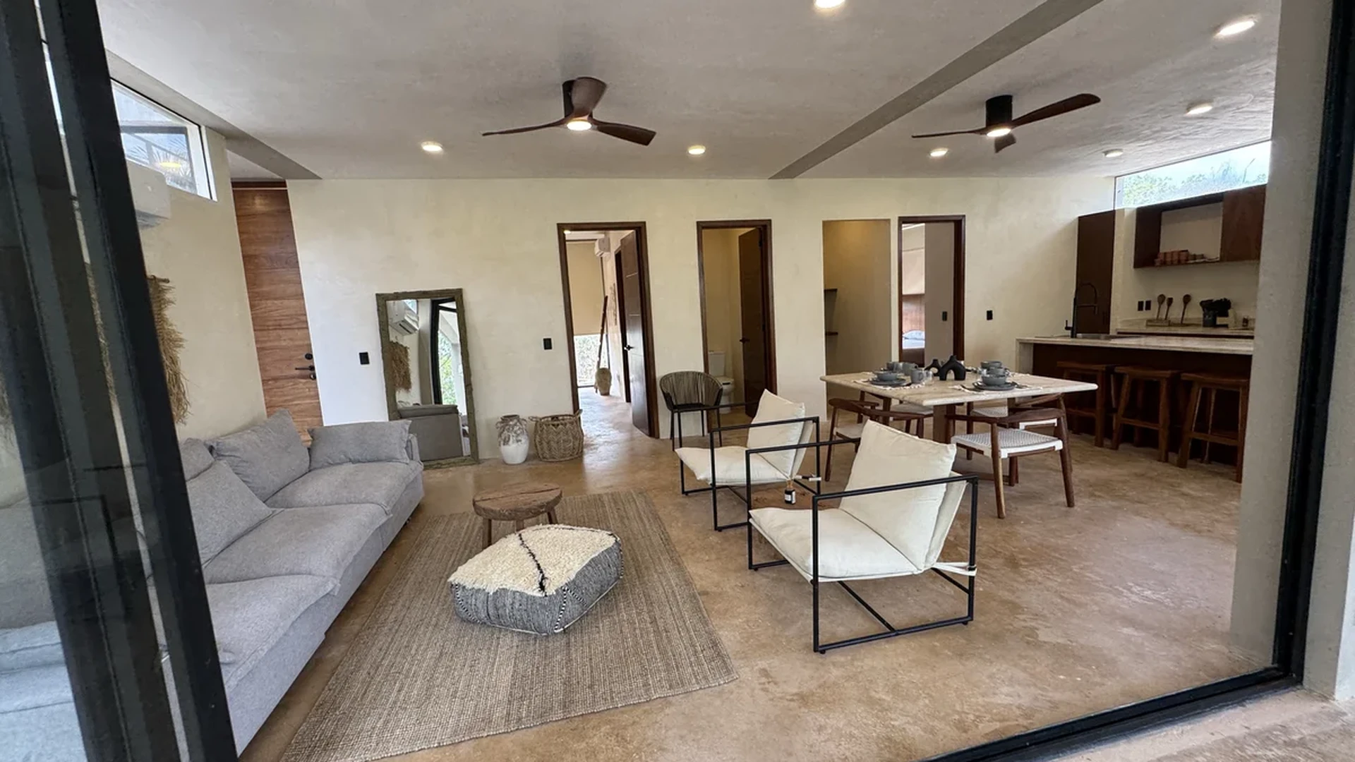 View of Modern Living Room at Limas Tulum, showcasing Open Concept Living, Contemporary Design.