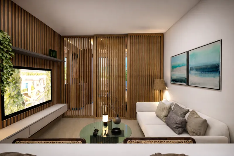 A modern living room rendering in a Soulam residence, featuring a white sofa with throw pillows, a round glass coffee table, and a large TV mounted on a slatted wooden accent wall. A sliding slatted wooden partition, indicating an optional bedroom...