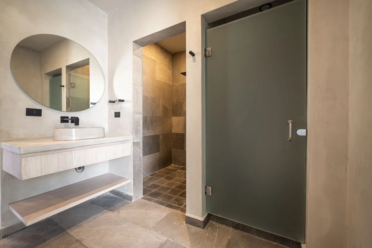 View of Modern Bathroom at NEEA, showcasing Walk-in Shower, Floating Vanity.
