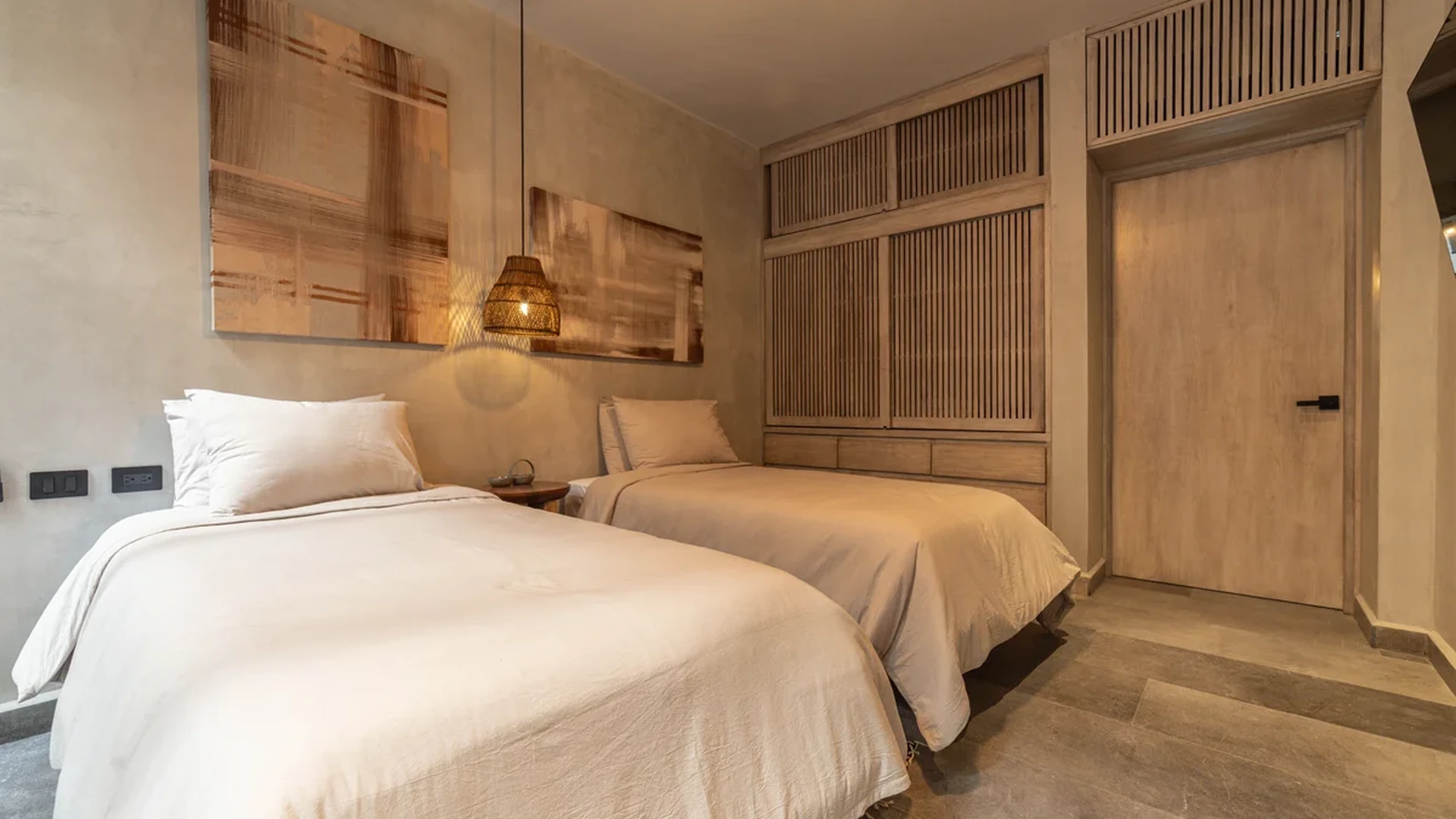 View of Bedroom at NEEA, showcasing Twin Beds, Modern Design.