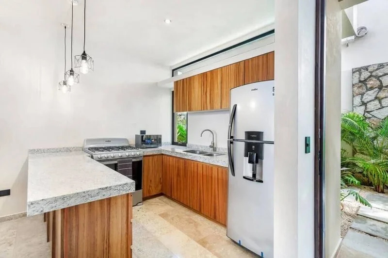 Image of Garden at Sands Tulum, featuring Modern Kitchen, Wood Cabinets.