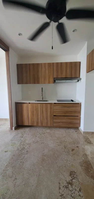 A collection of interior and balcony photos from Lik Xelba, showcasing a finished bedroom with a wooden wardrobe, ceiling fan, air conditioning, and a balcony with a spiral staircase, alongside a modern bathroom with a white sink, toilet, and glas...