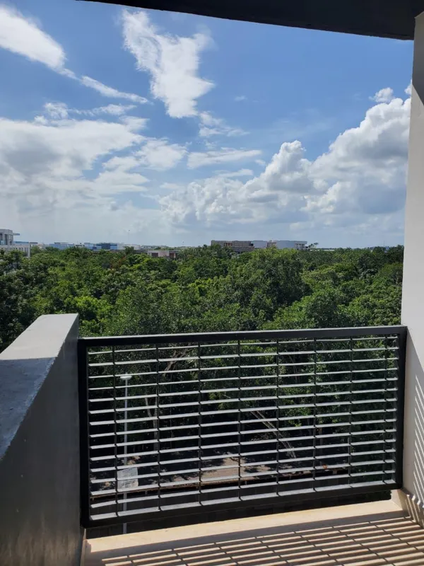 A collection of interior and balcony photos from Lik Xelba, showcasing a finished bedroom with a wooden wardrobe, ceiling fan, air conditioning, and a balcony with a spiral staircase, alongside a modern bathroom with a white sink, toilet, and glas...