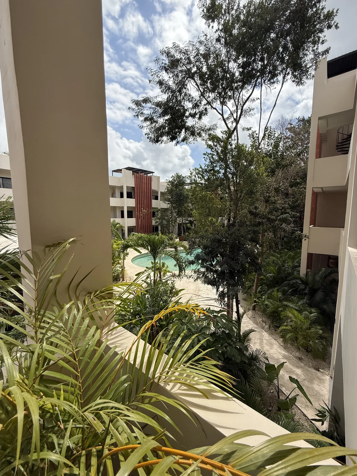 Image of Swimming Pool at AAK, featuring Resort-style Pool, Lush Landscaping.