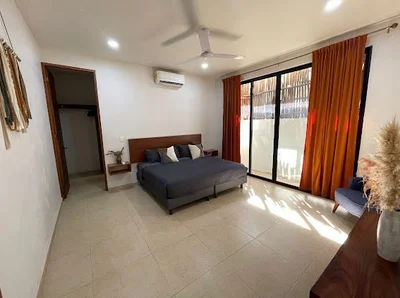 View of Modern Bedroom at Akasha Homes, showcasing King Size Bed, Private Terrace Access.