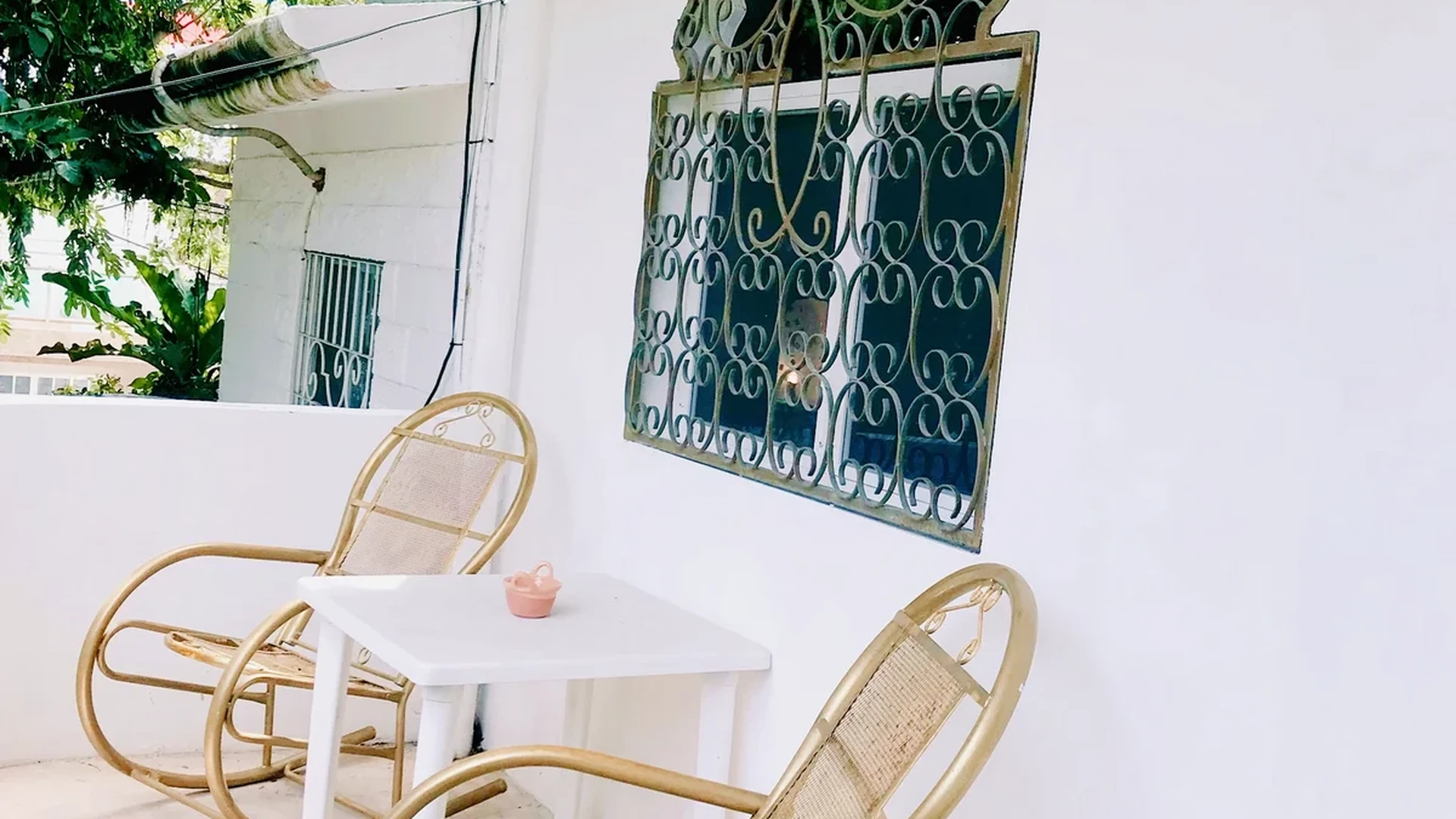 View of Outdoor Seating at Casa Dragonfly, showcasing Private Balcony, Patio Furniture.