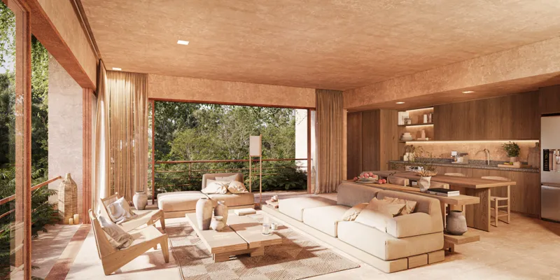 A warm, inviting render of a spacious living room and open-plan kitchen in an Aldea Kalan apartment, featuring natural wood tones, light-colored furniture, and large sliding glass doors opening to a lush green balcony, embodying the Wabi Sabi phil...