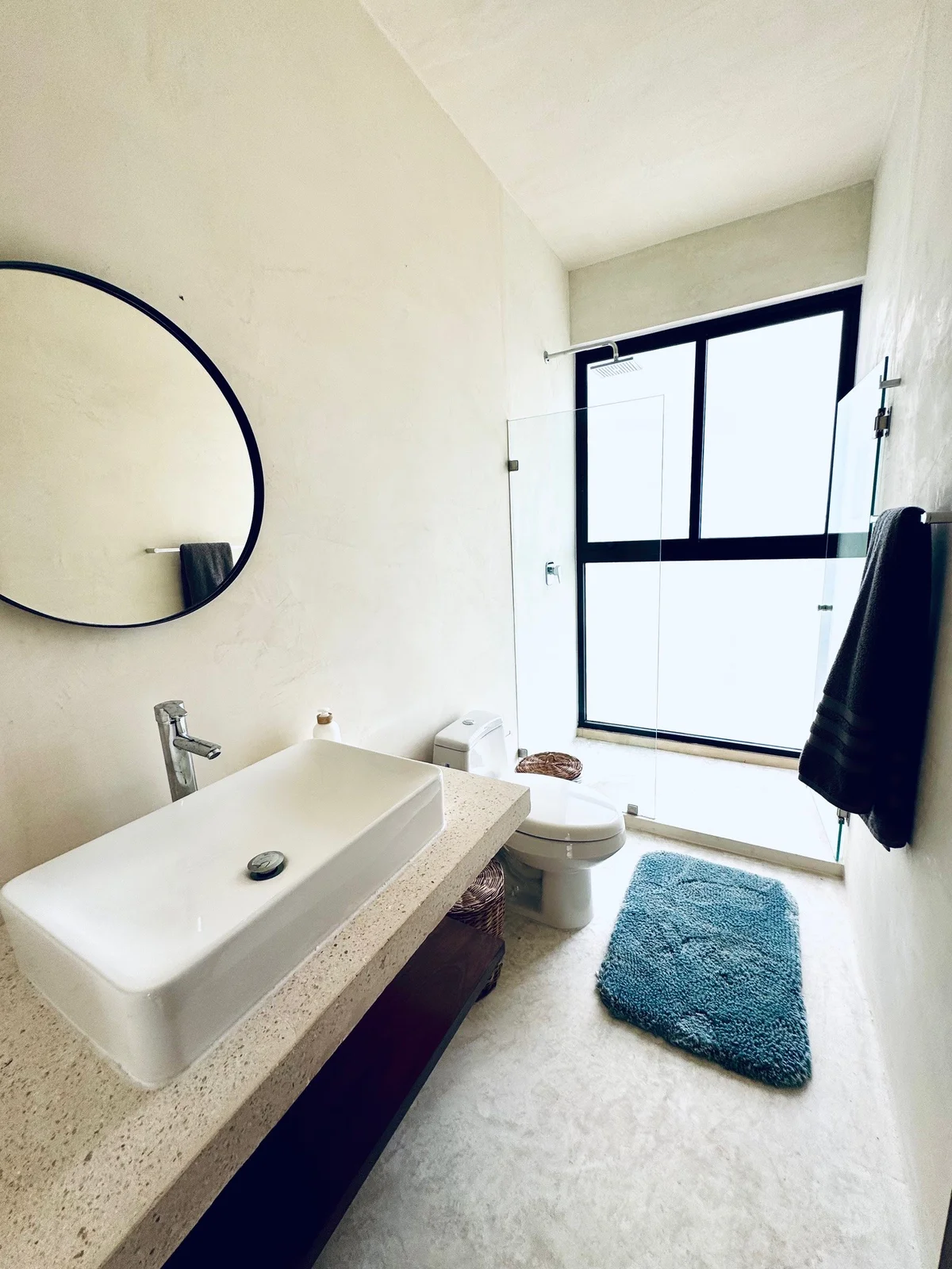 View of Modern Bathroom at Xeiba, showcasing Minimalist Design, Contemporary Bathroom.