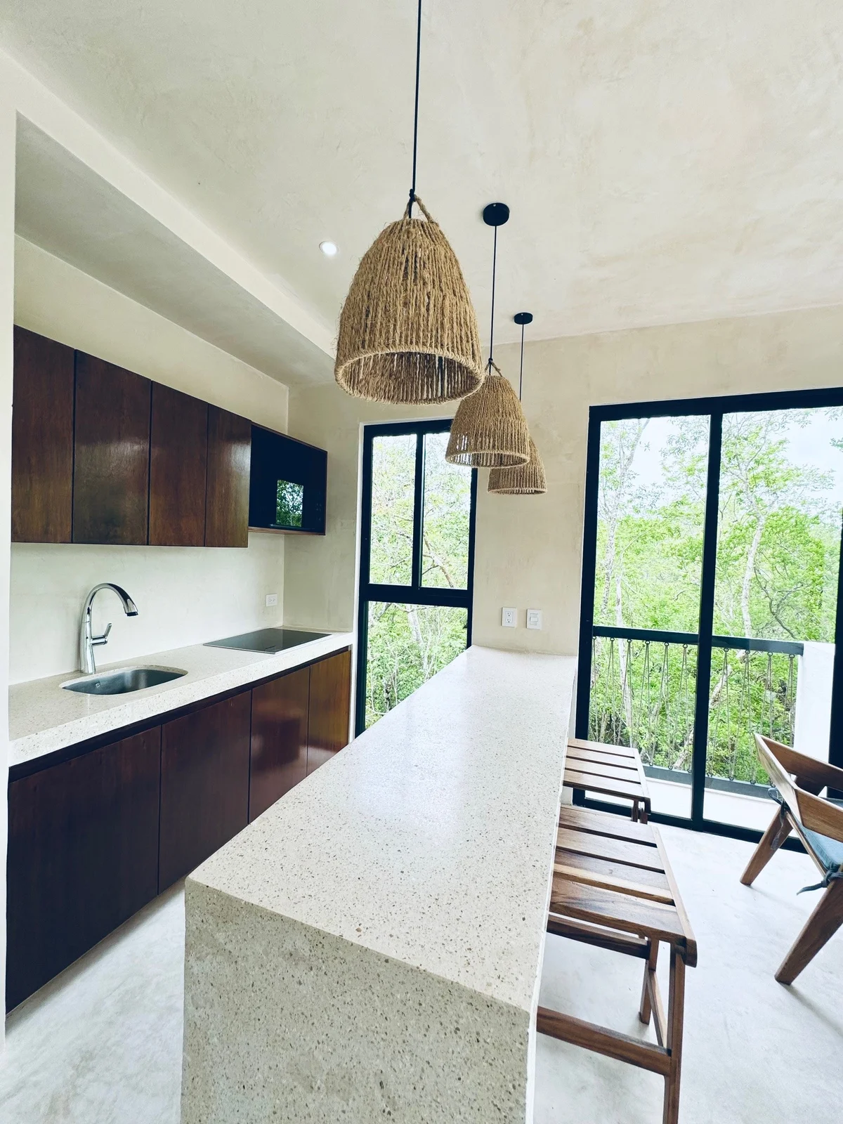 View of Modern Kitchen at Xeiba, showcasing Kitchen Island, Jungle View.