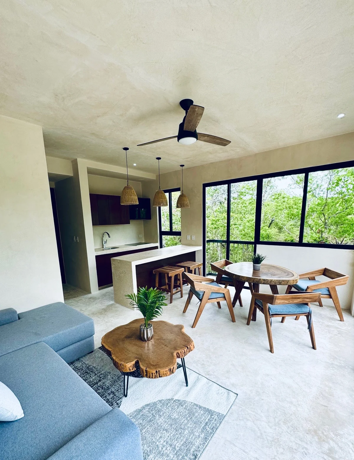View of Open Concept Living at Xeiba, showcasing Modern Interior Design, Jungle View.