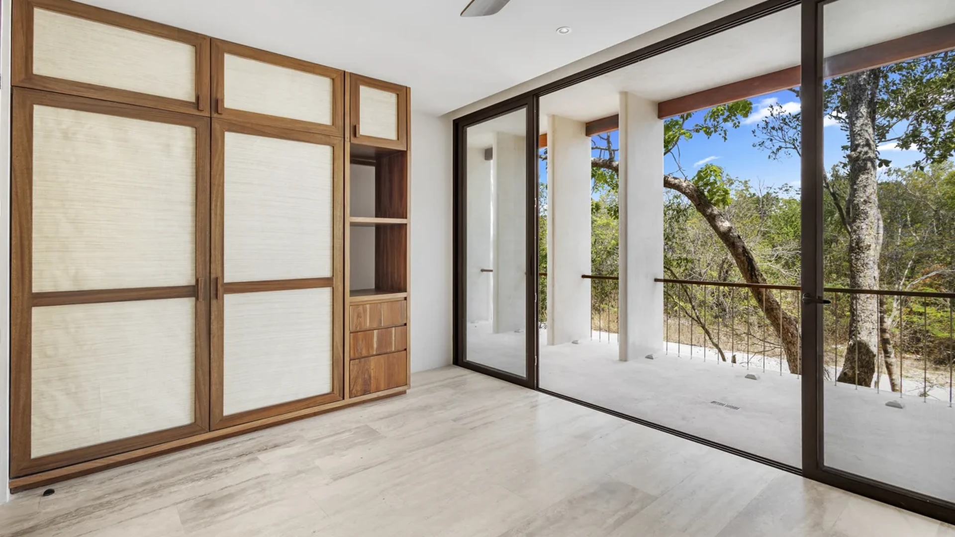 View of Bedroom at Casa Kaa, showcasing Modern Interior, Built-in Wardrobe.
