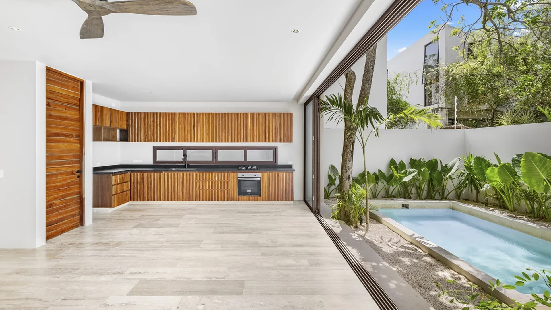 Image of Swimming Pool at Casa Kaa, featuring Modern Kitchen, Indoor-Outdoor Living.
