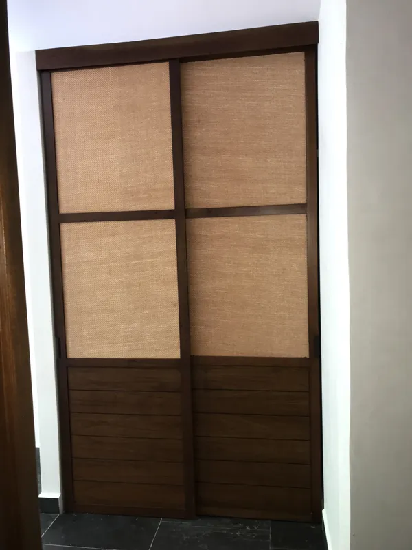 A series of high-resolution photographs displaying the completed interiors and private outdoor spaces of Humana's residential units. Images include a contemporary kitchen with dark grey and wood cabinets, a large island, and stainless steel applia...