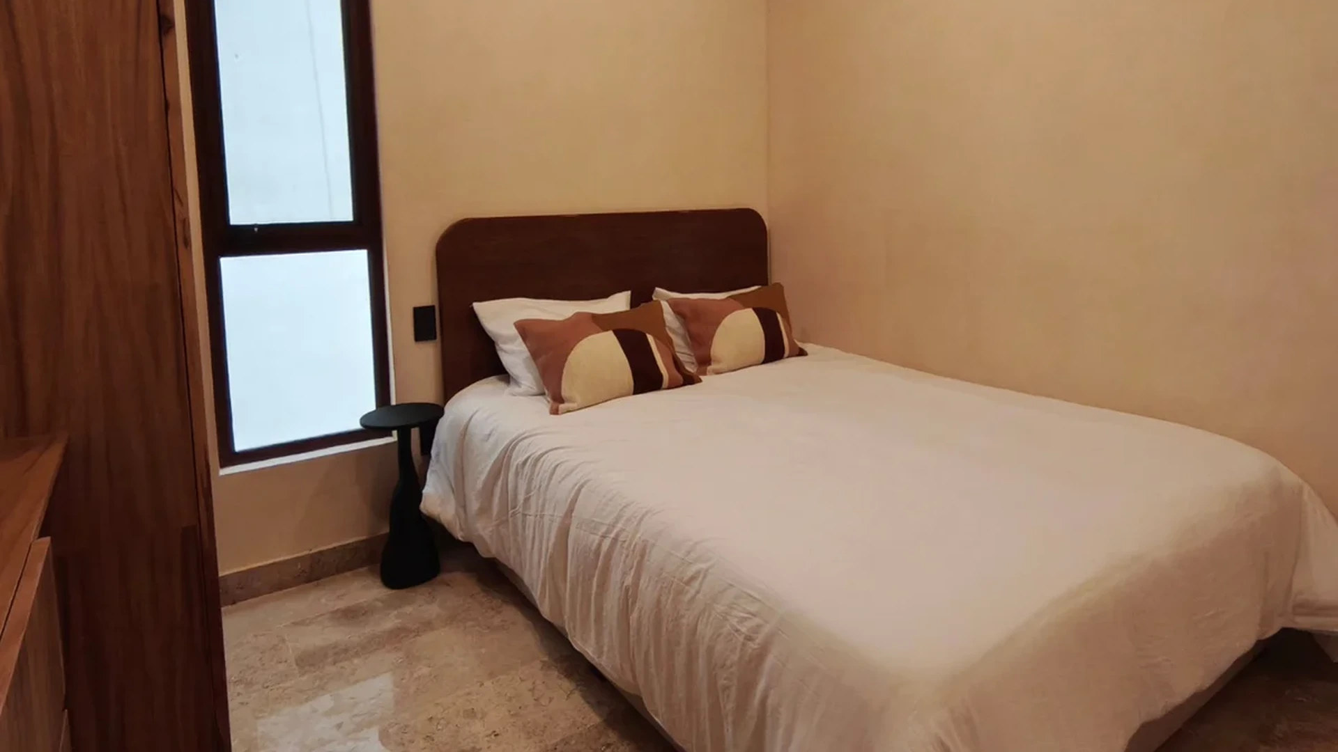 View of Bedroom at Uxmal, showcasing Modern Bedroom, Clean Interior.