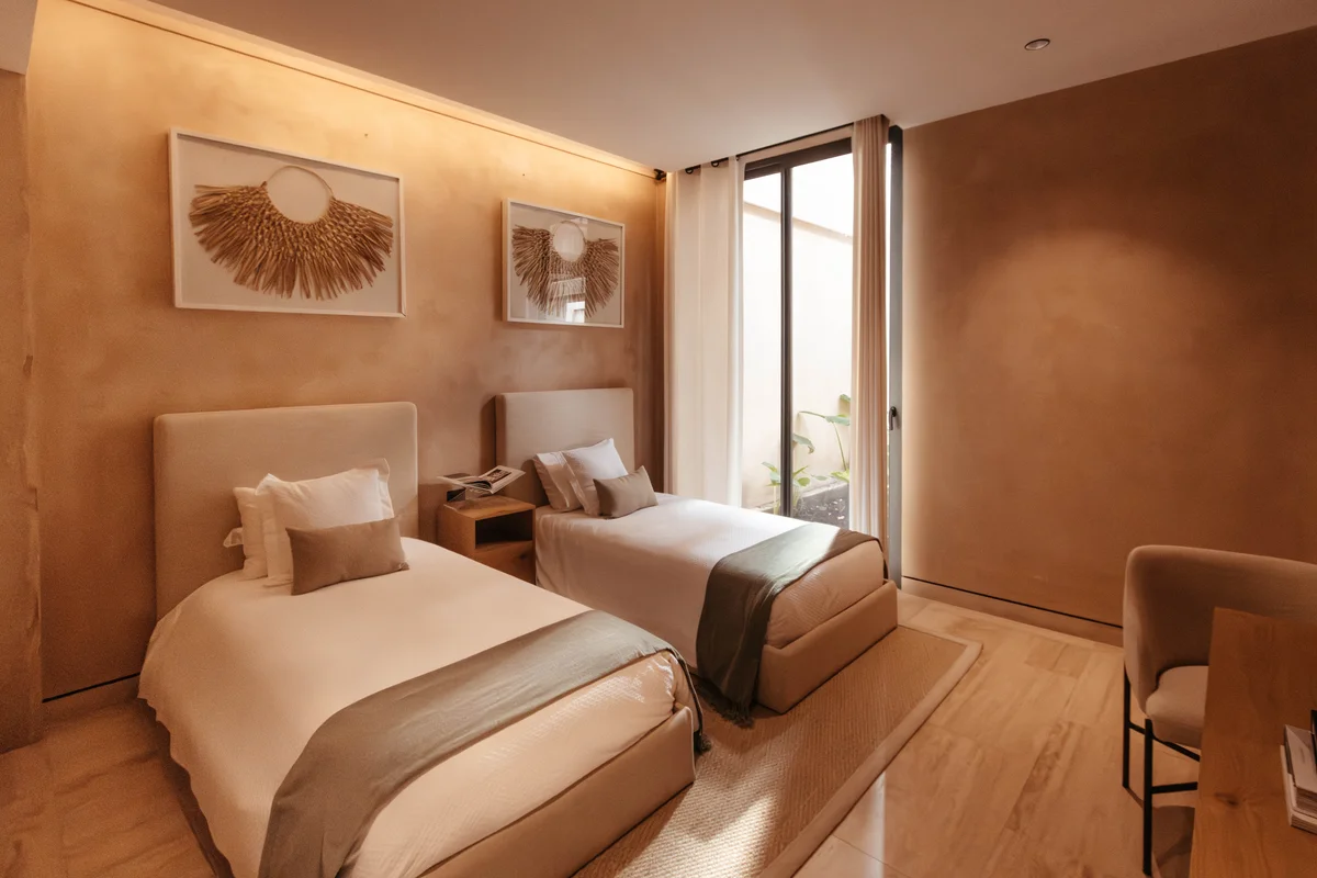 Image of Garden at The Village, featuring Bedroom, Twin Beds.