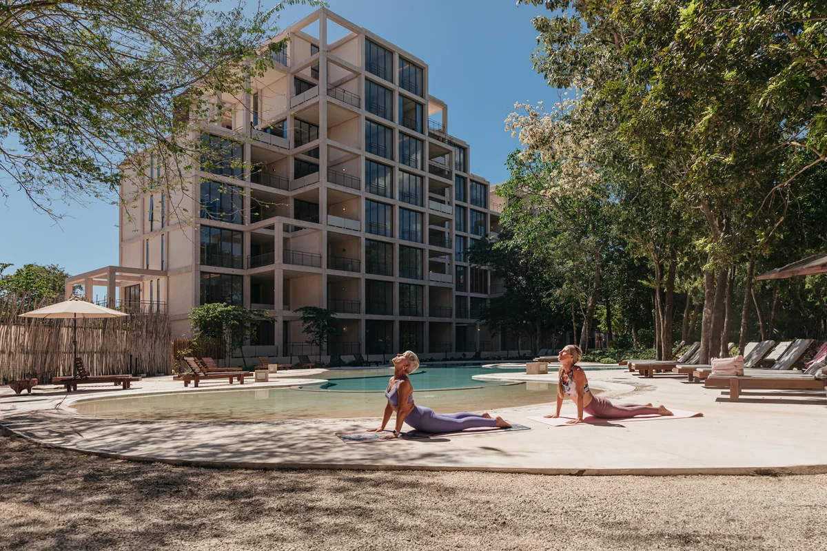 Image of Swimming Pool at The Village, featuring Modern Residential Building, Resort Style Pool.