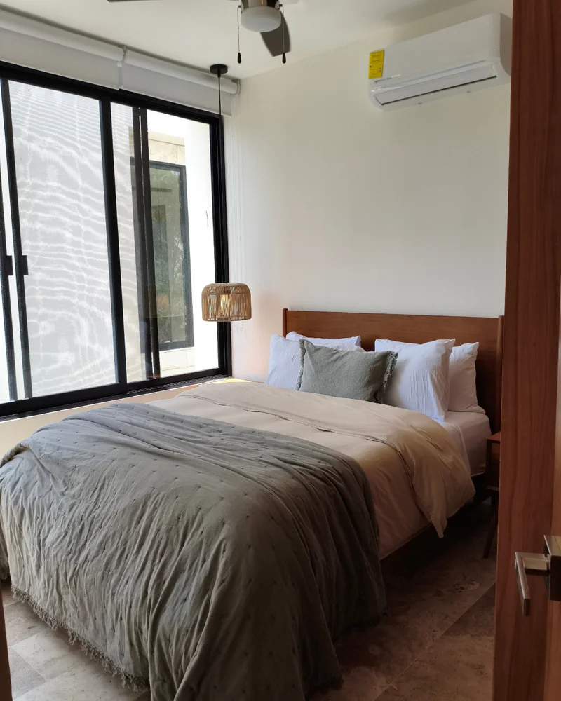 View of Bedroom at Poc Ta Poc, showcasing Modern Bedroom, Natural Light.