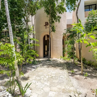 Image of Garden at Peregrina, featuring Tropical Landscaping, Modern Exterior.